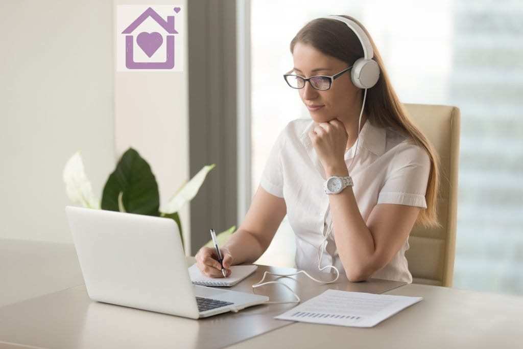 Woman working at home while listening