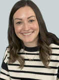 Emily-Jackson-Psychologist-the-purple-house-clinic_160 Professional headshot of Emily Jackson, psychologist at the Purple House Clinic.