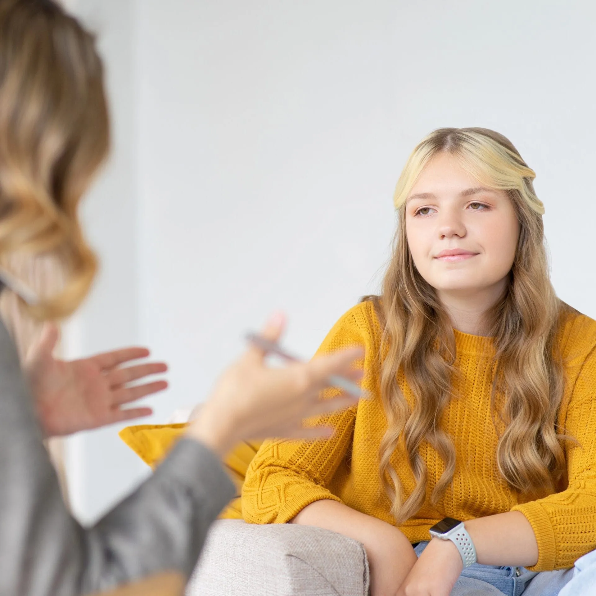 Therapist talking to client in a mental health clinic